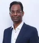 Dr. Joy Varghese